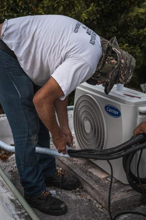 AC technician at work